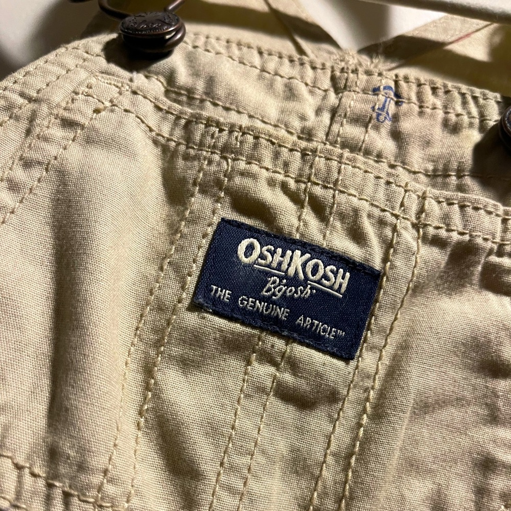 Olive green and Tan Oshkosh Bgosh overalls . Used once for 6 month baby boy Both